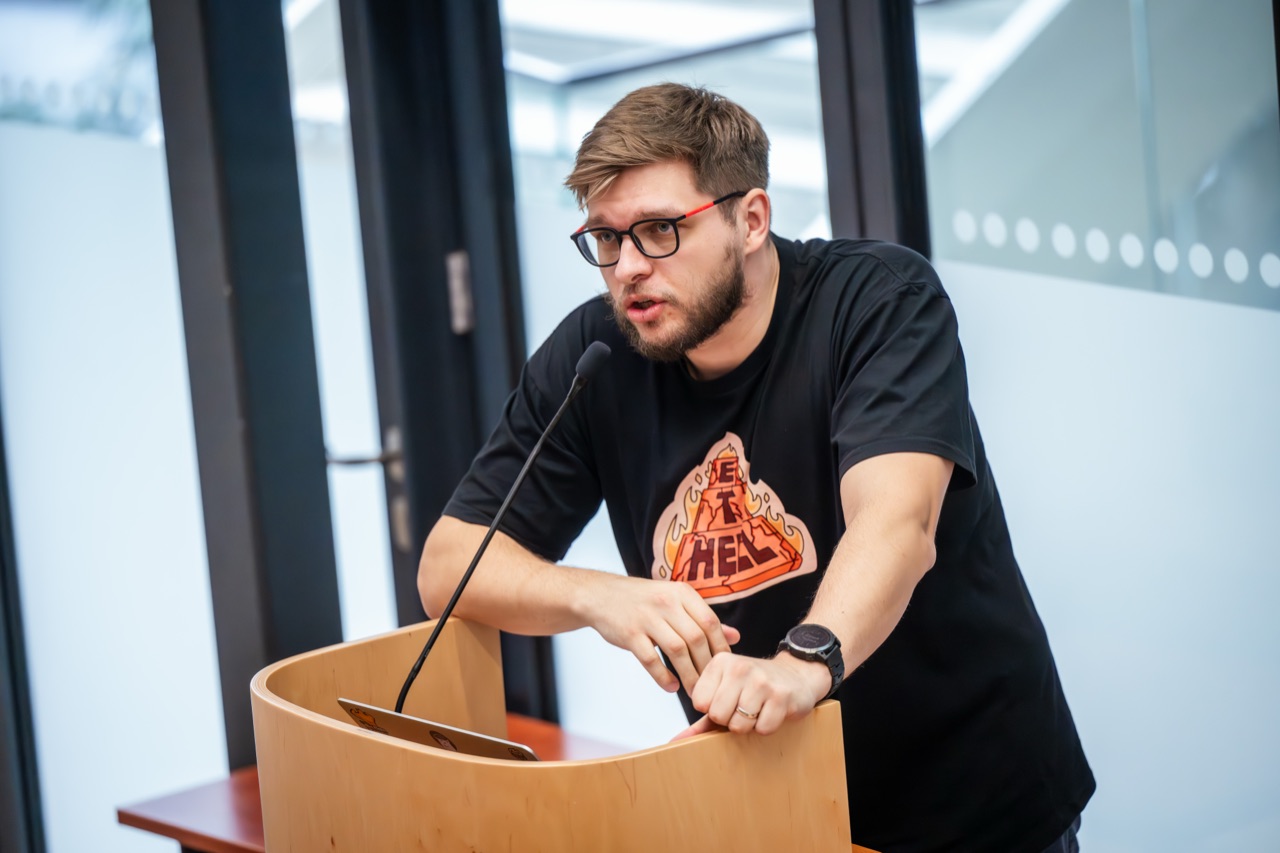 Tomas Peluritis speaking at PyCon Lithuania 2024